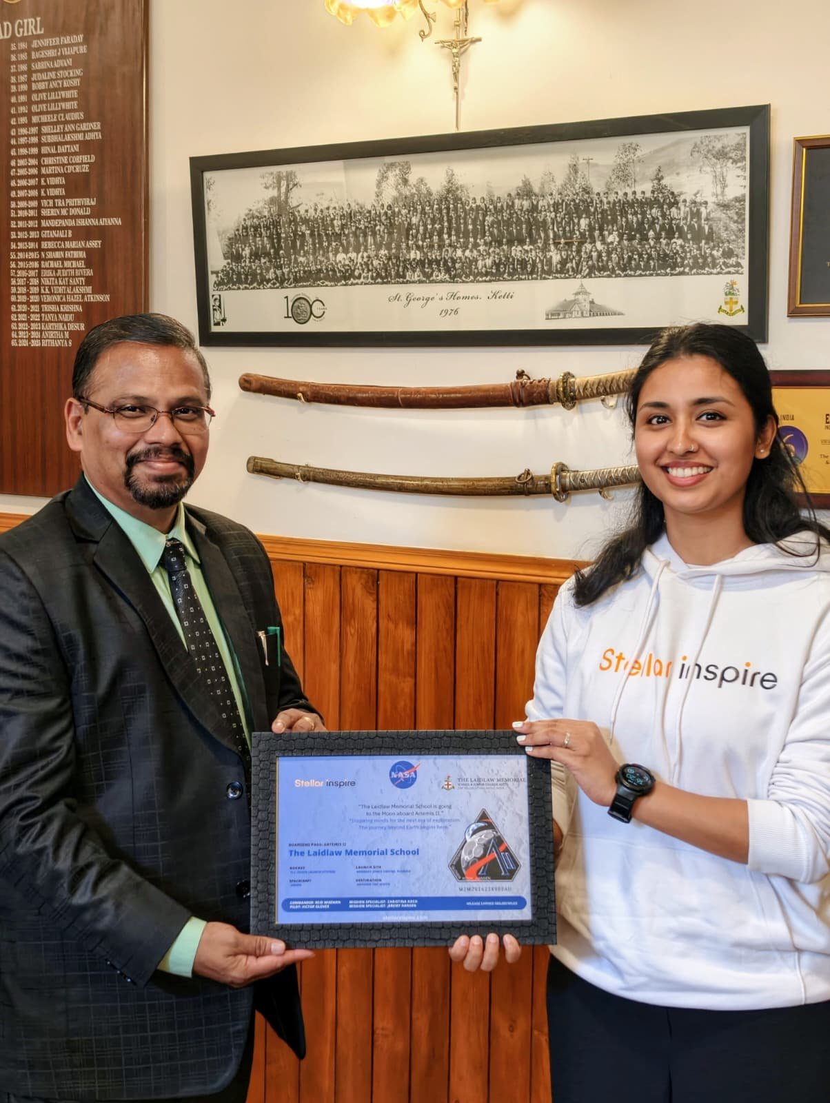 Presenting the NASA Artemis II boarding pass to The Laidlaw Memorial School